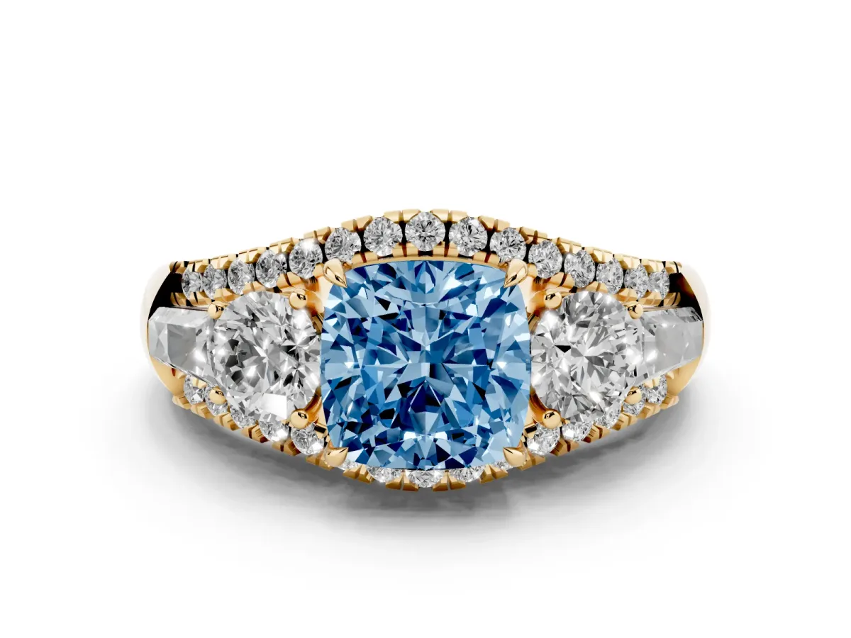 Fancy Blue Three-Stone Cushion Cut Diamond Engagement Ring with Pave Band and Prong Setting Yellow gold