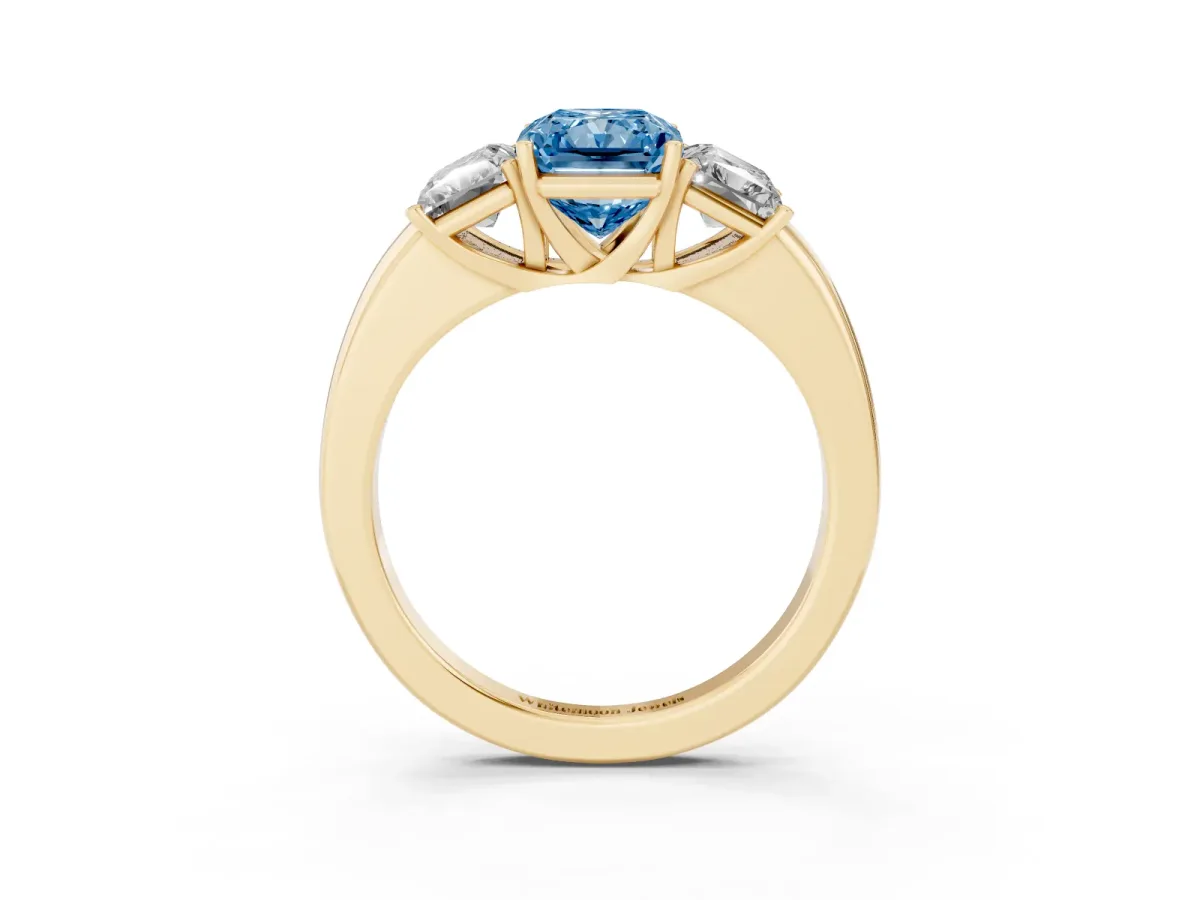 Fancy Blue Radiant Cut Diamond Three-Stone Ring with Four-Prong Setting and Classic Band Yellow gold