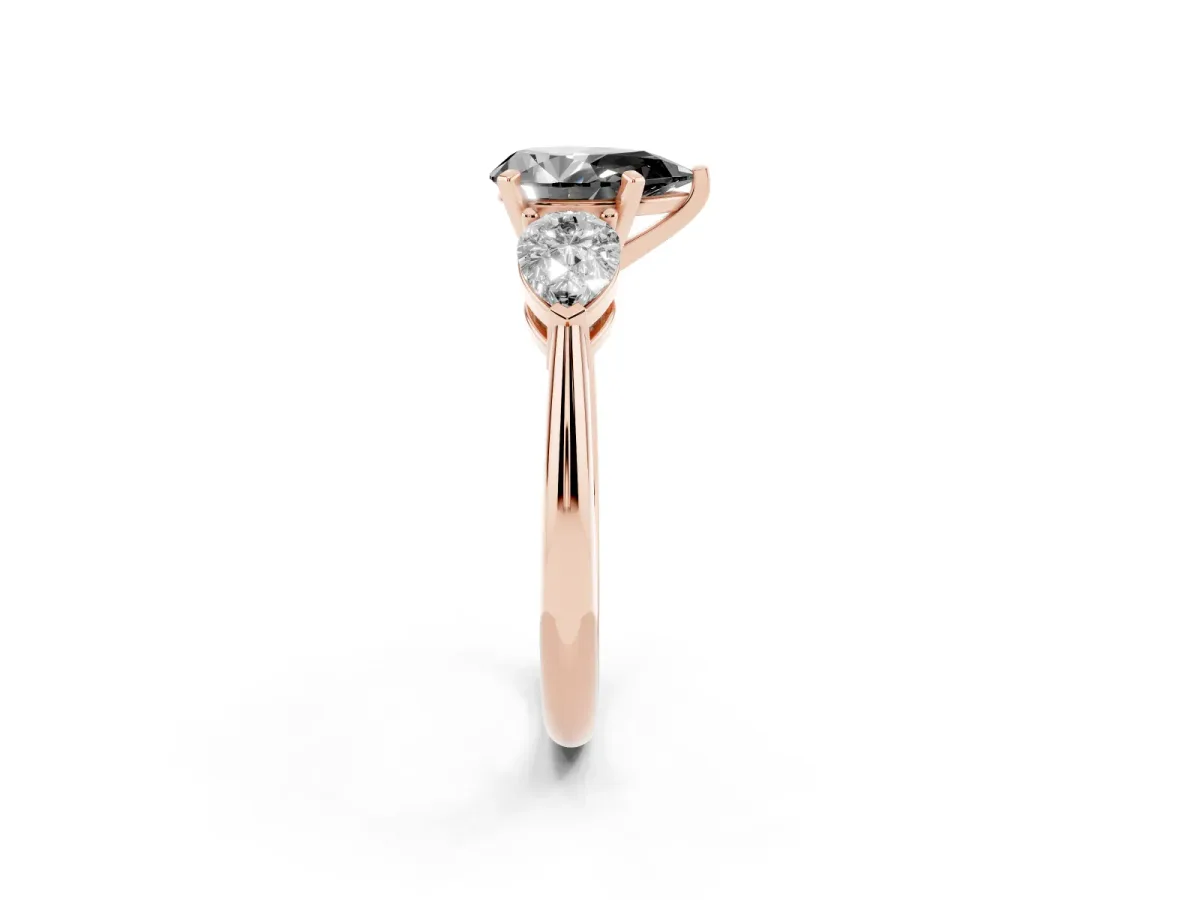 Fancy Black Three-Stone Pear Cut Diamond Ring with Pear Side Stones and Four-Prong Setting Rose gold