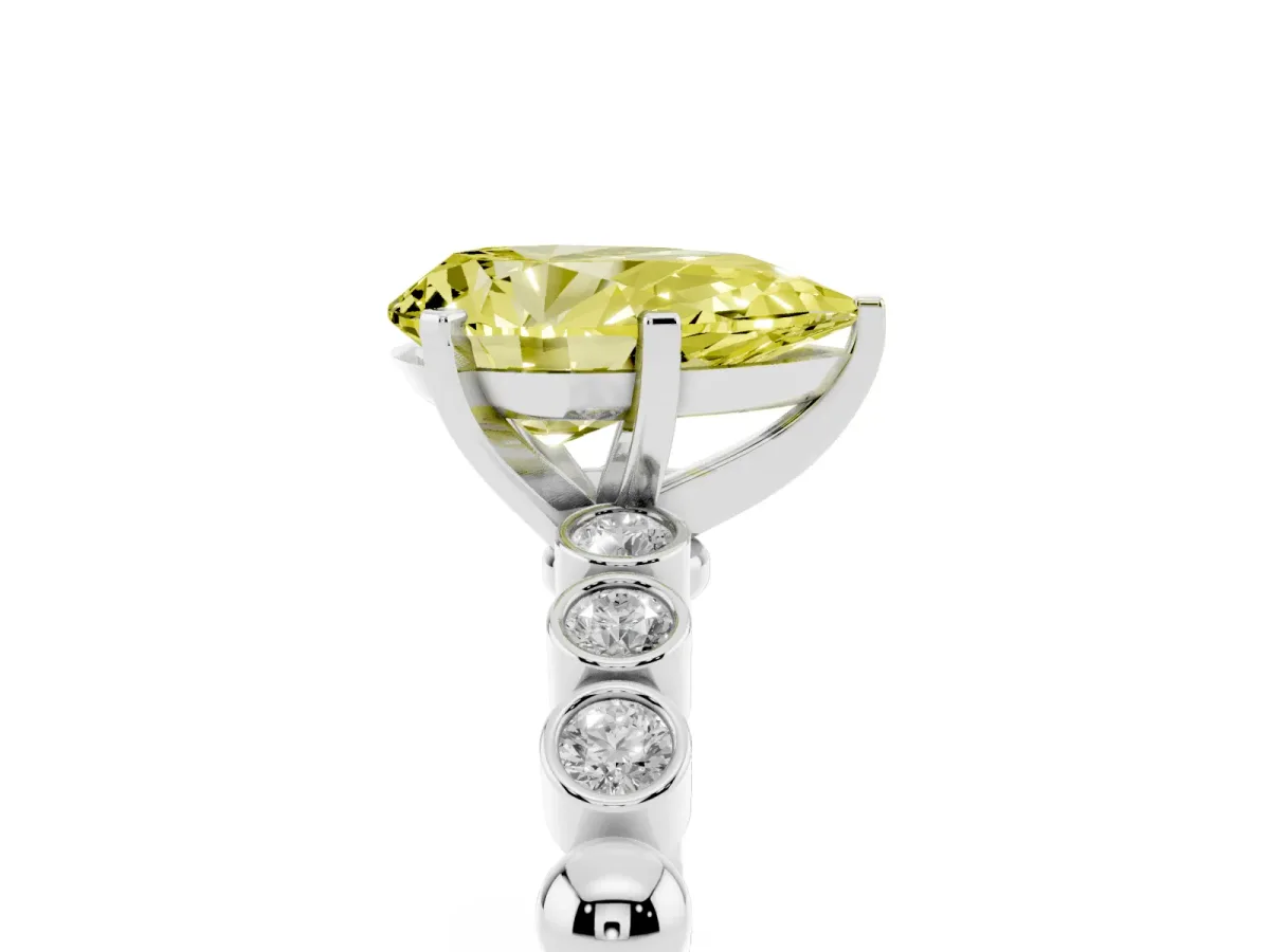 Fancy Yellow Pear Cut Solitaire Bezel Accent Diamond Engagement Ring with Beaded Band and Four-Prong Setting Platinum