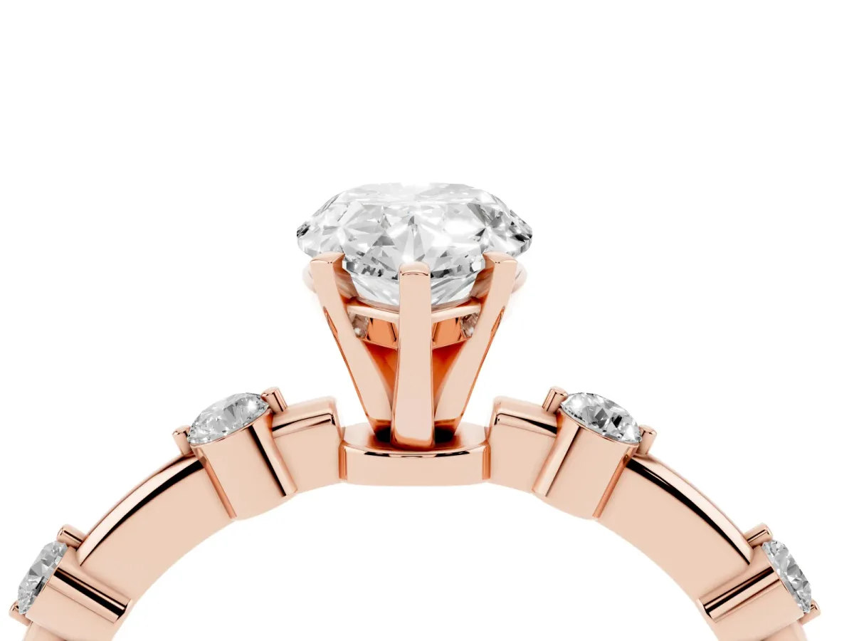 Pear Cut Solitaire Diamond Ring with Bezel Set Side Stones and Prong Setting Rose gold