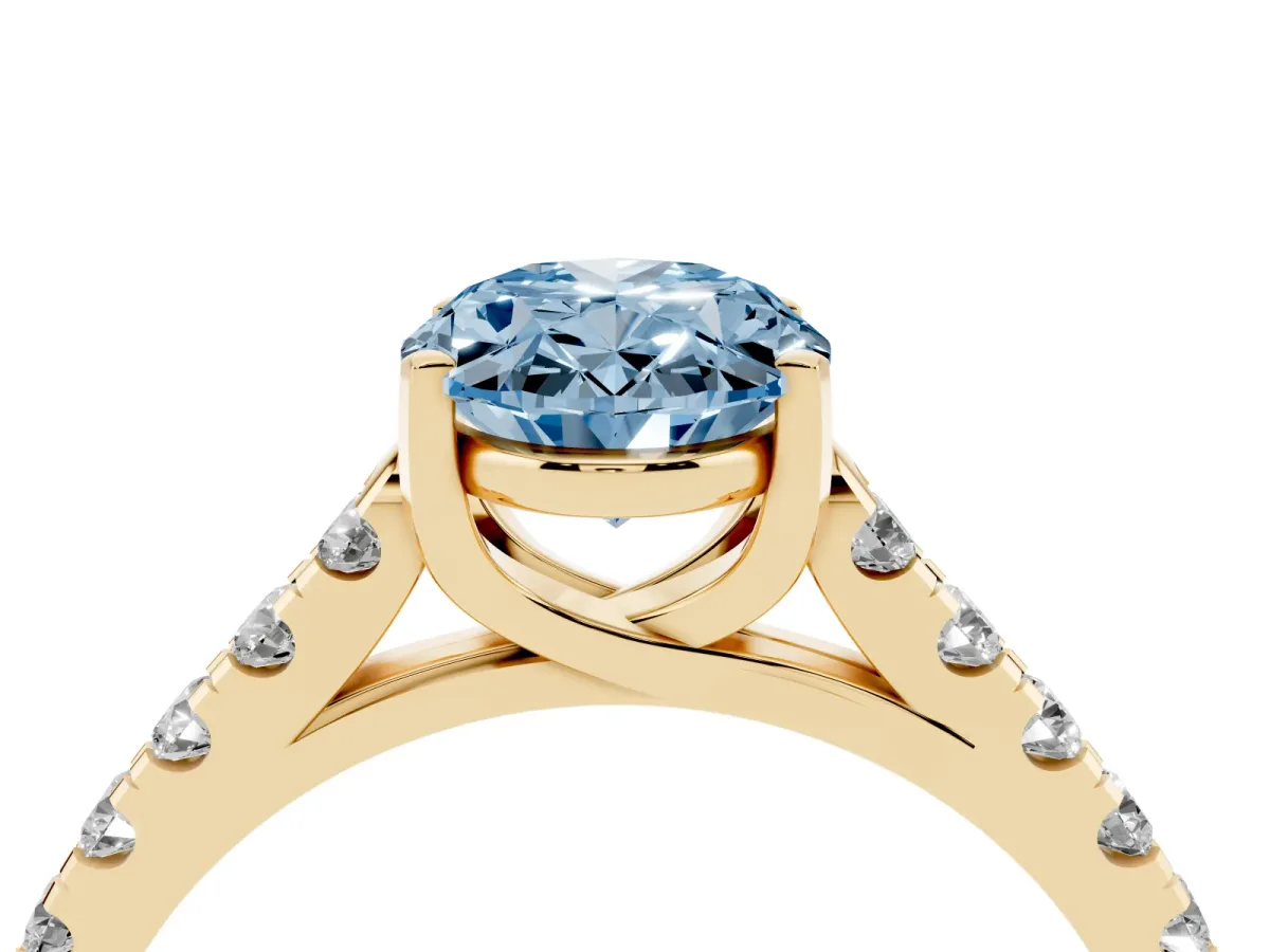 Fancy Blue Oval Cut Diamond Pavé Band Solitaire Ring with Prong Setting Yellow gold
