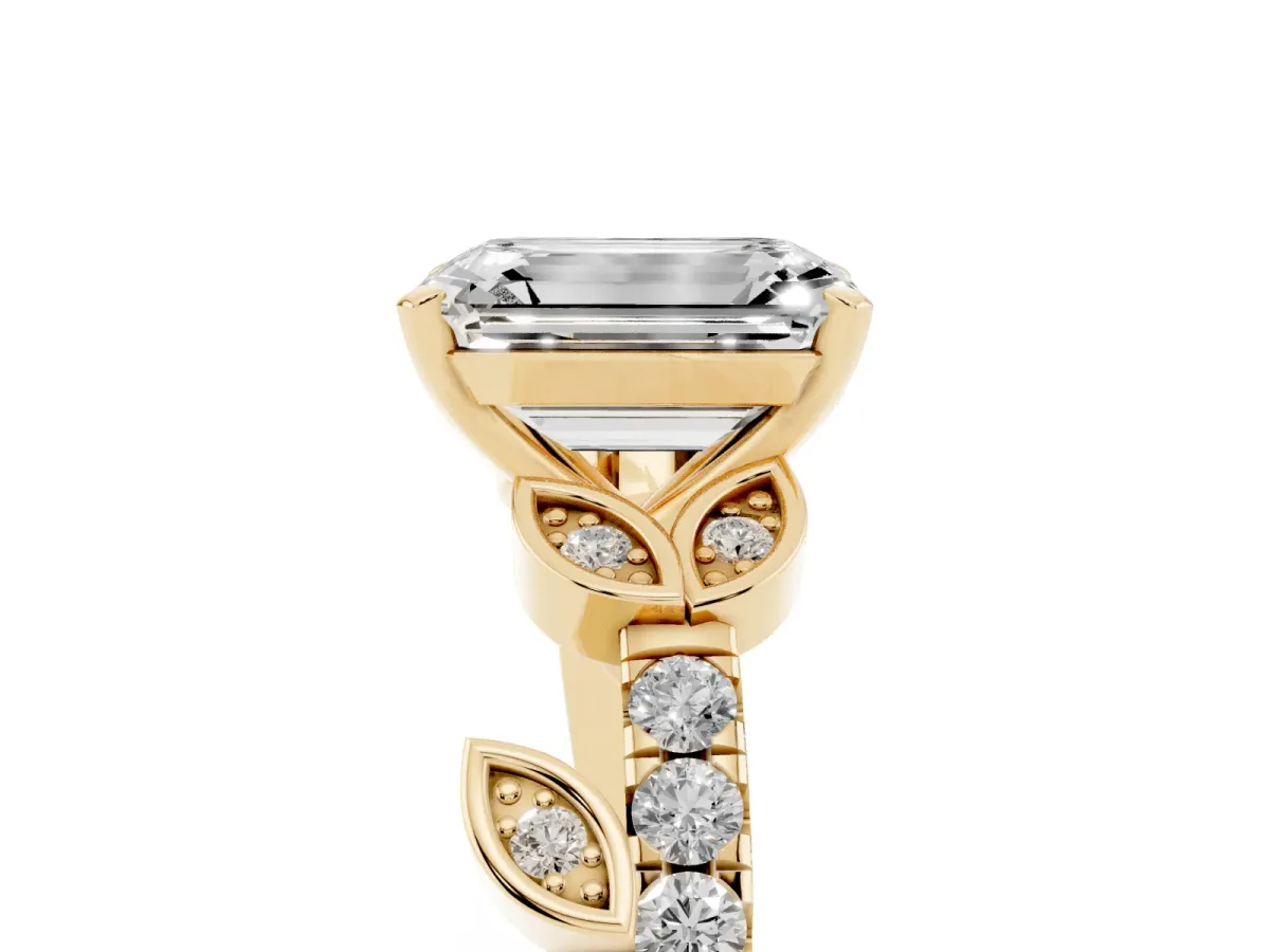 Emerald Cut Solitaire Leaf-Inspired Diamond Ring with Pavé Band and Four-Prong Setting Yellow gold