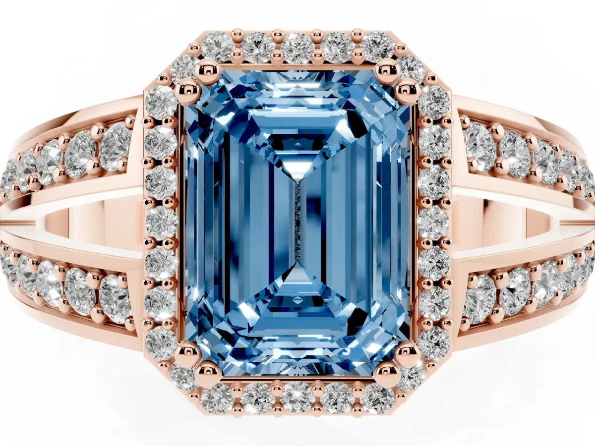 Fancy Blue Emerald Cut Diamond Halo Ring with Split Shank Pavé Band and Four-Prong Setting Rose gold