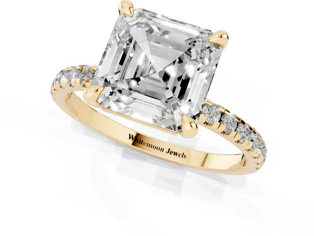 Asscher Cut Diamond Brilliant Solitaire Ring with Pavé Band and Four-Prong Setting Yellow gold