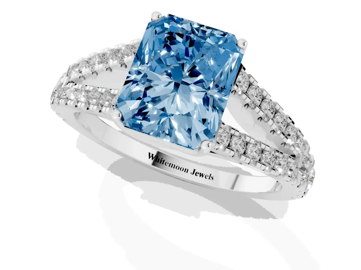 Fancy Blue Radiant Cut Diamond Split Shank Engagement Ring with Round Pavé and Prong Setting Silver