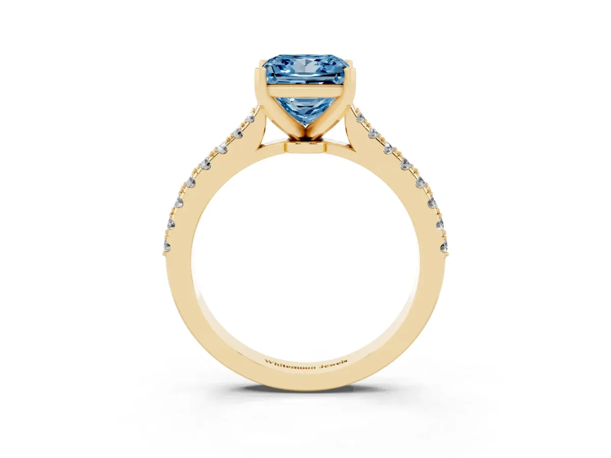 Fancy Blue Princess Cut Cut Solitaire Diamond Engagement Ring with Pave Band and Four-Prong Setting Yellow gold