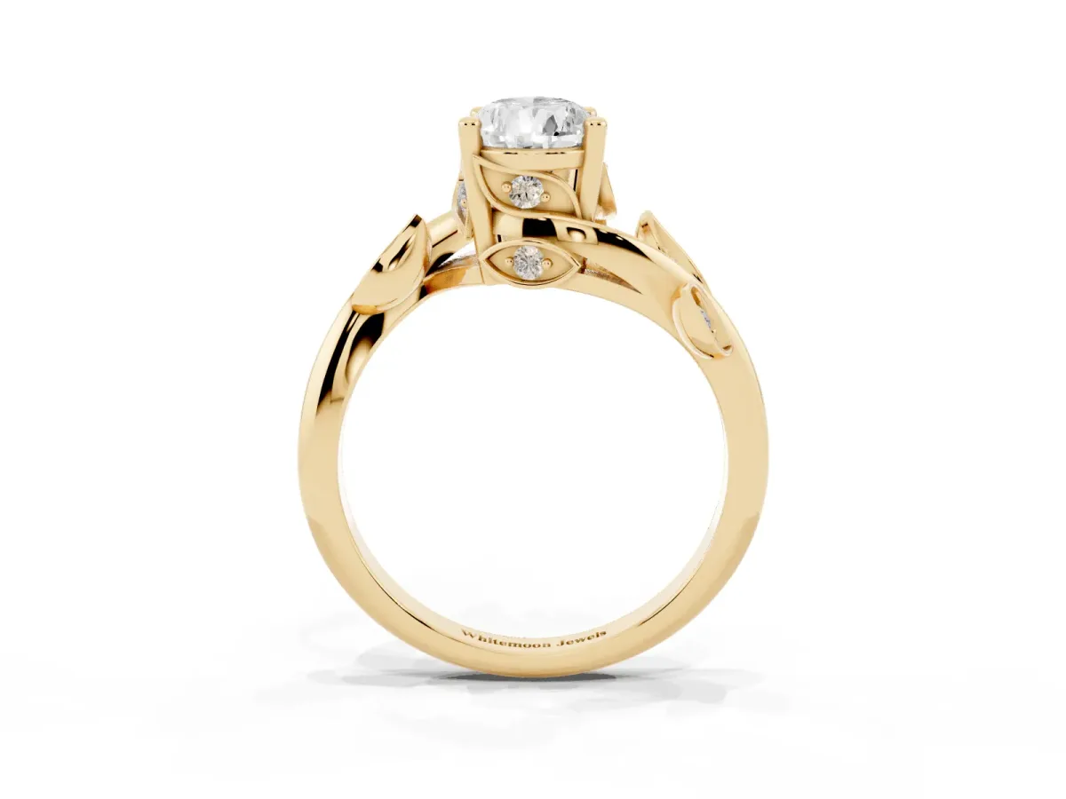 Pear Cut Solitaire Twist Engagement Ring with Leaf Accents and Prong Setting Yellow gold