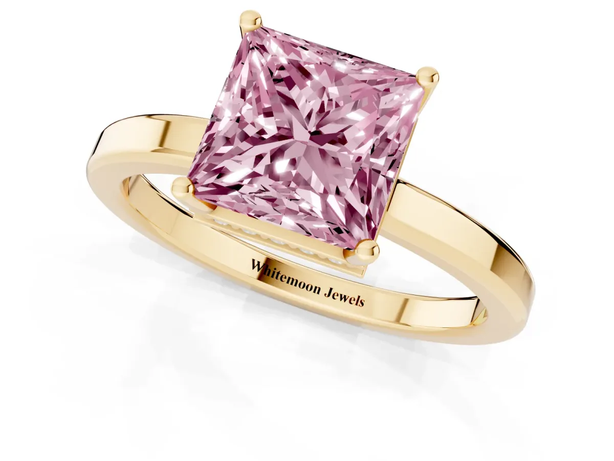Fancy Pink Princess Cut Cut Solitaire Engagement Ring with Four-Prong Setting on a Classic Band Yellow gold