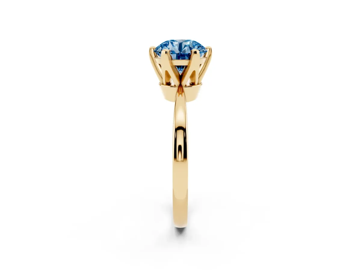 Fancy Blue Round Cut Solitaire Engagement Ring with Six-Prong Setting and Tapered Band Yellow gold