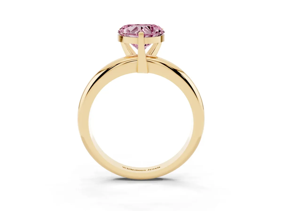 Fancy Pink Heart Cut Diamond Solitaire Engagement Ring with Round Band and Four-Prong Setting Yellow gold