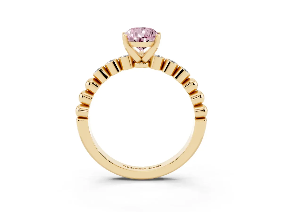 Fancy Pink Pear Cut Solitaire Bezel Accent Diamond Engagement Ring with Beaded Band and Four-Prong Setting Yellow gold