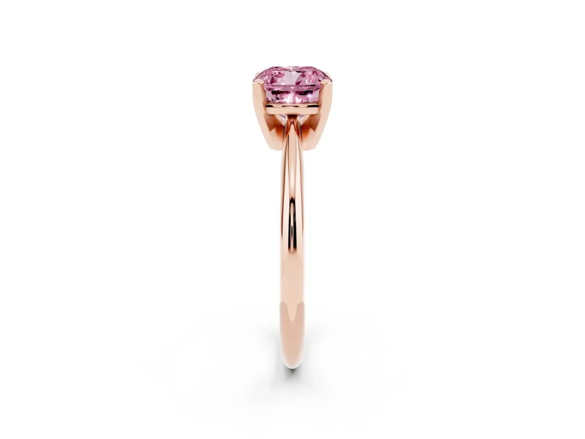 Fancy Pink Cushion Cut Cut Solitaire Ring with Four-Prong Setting on a Classic Band Rose gold