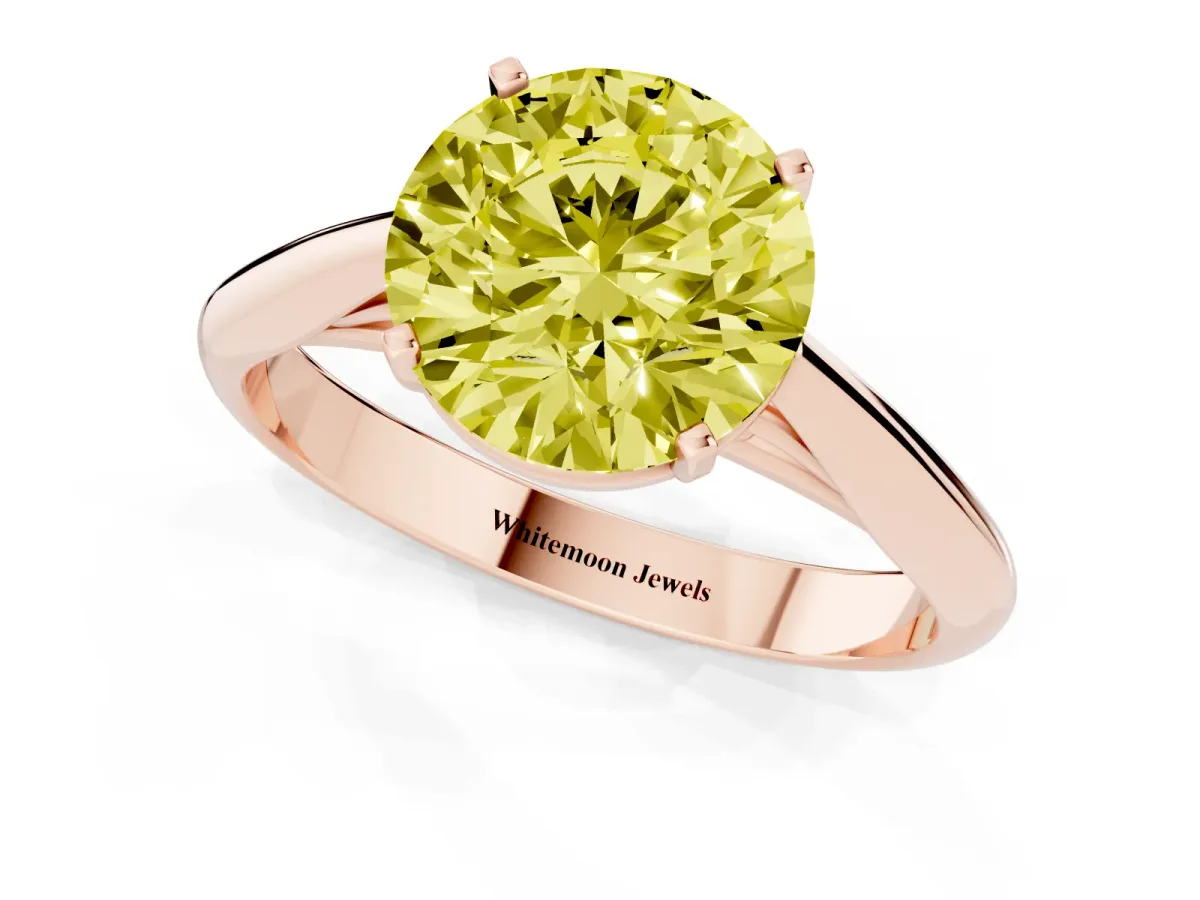 Fancy Yellow Round Cut Diamond Solitaire Engagement Ring with Cathedral Setting and Four-Prong Mount Rose gold