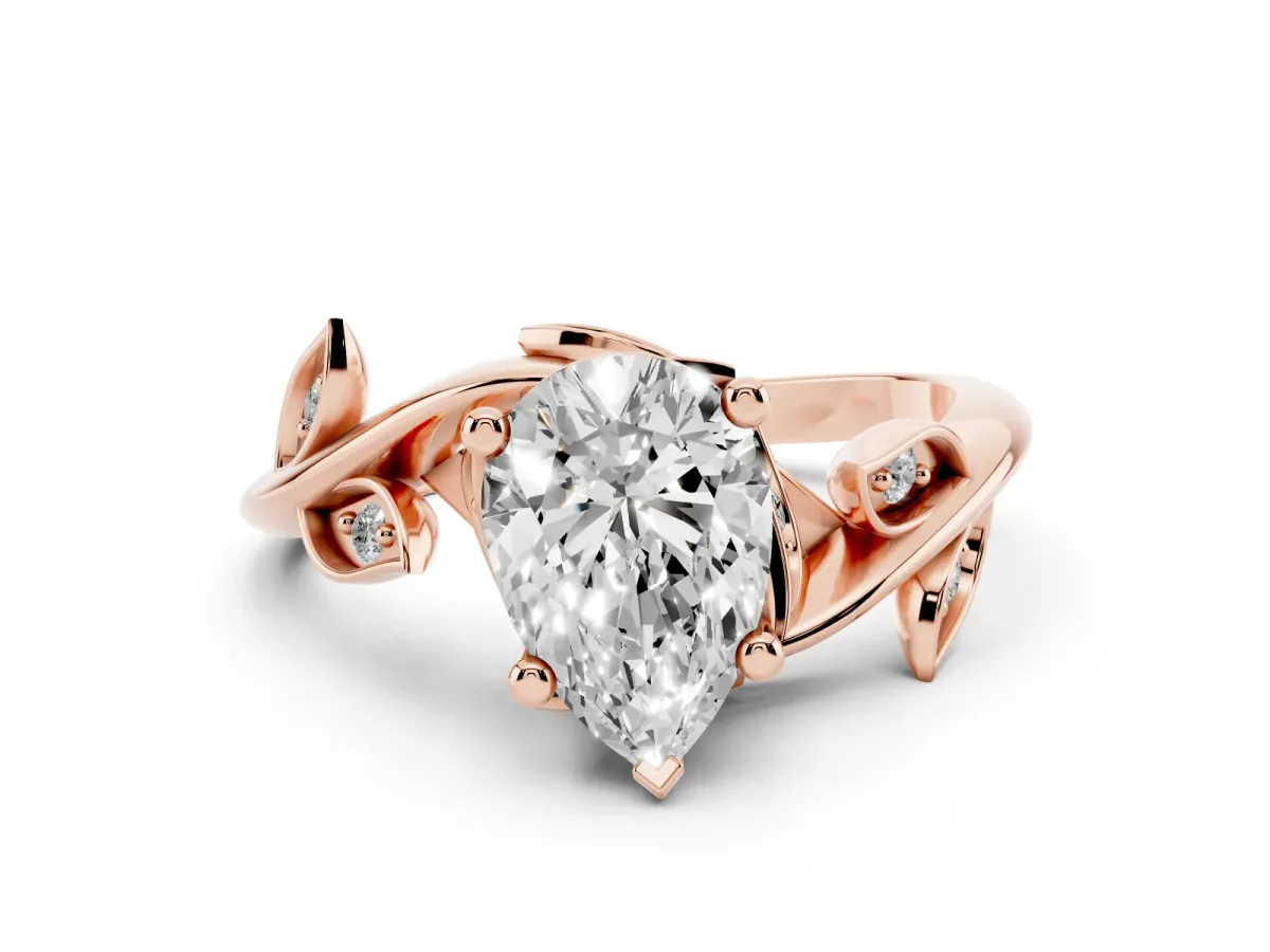 Pear Cut Solitaire Twist Engagement Ring with Leaf Accents and Prong Setting Rose gold