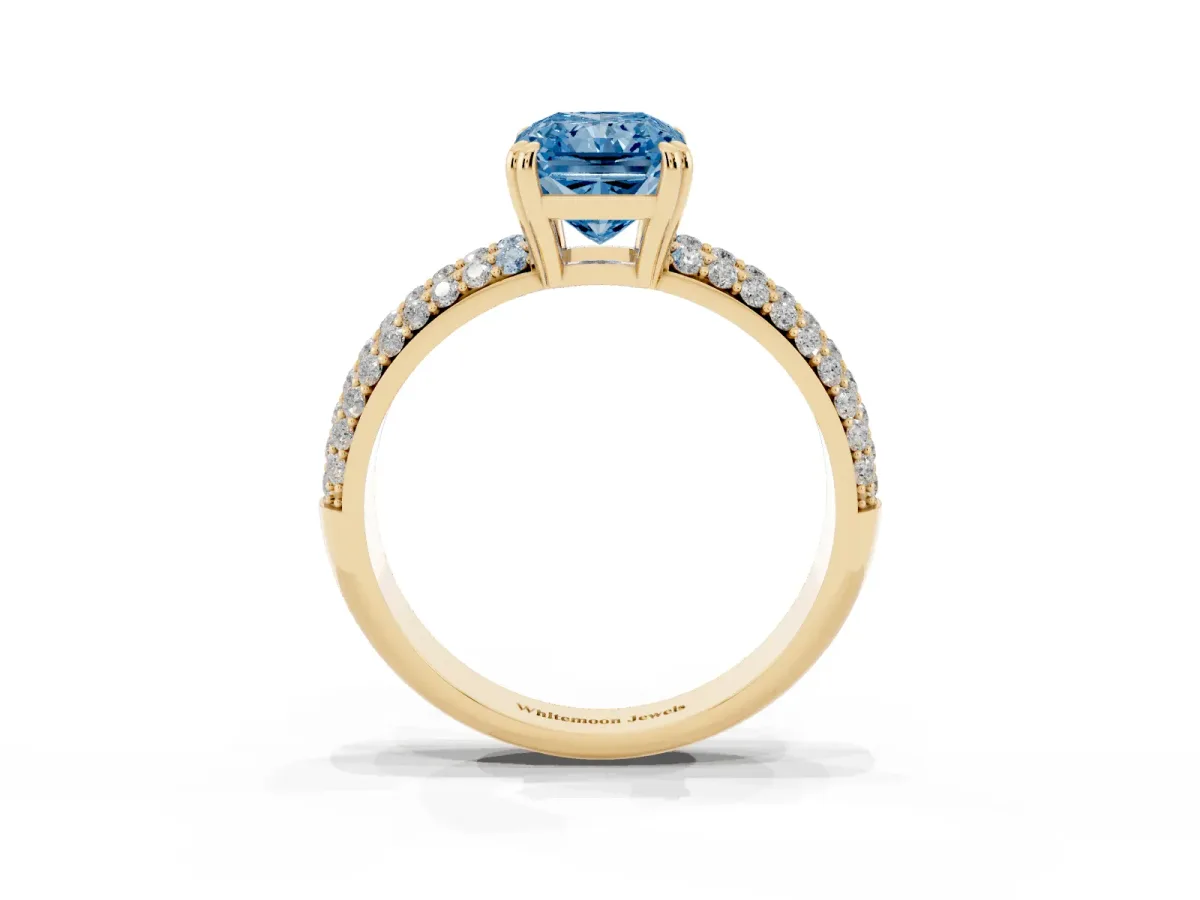 Fancy Blue Radiant Cut Diamond Solitaire Ring with Multi-Row Round Pavé Band and Prong Setting Yellow gold