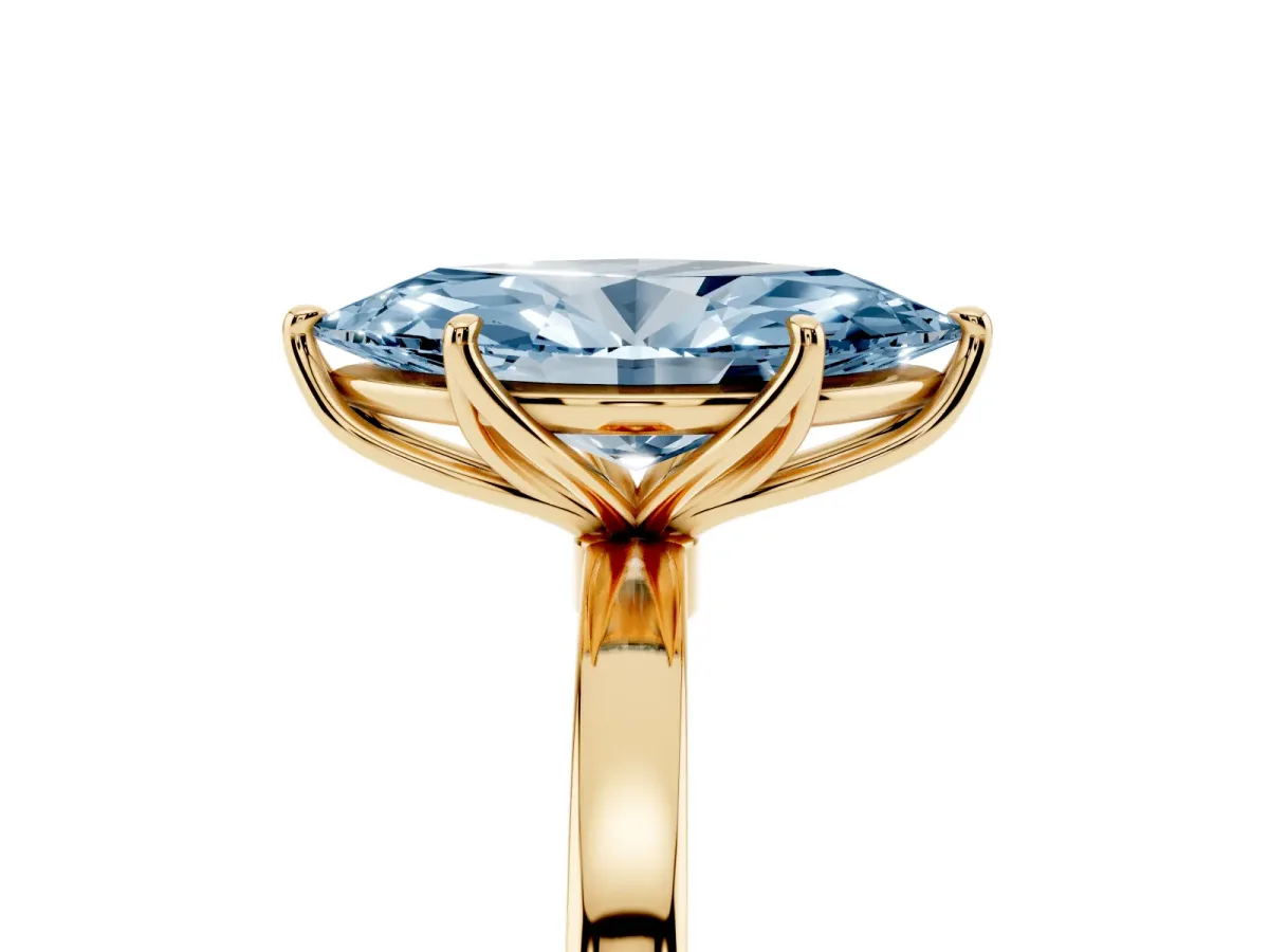 Fancy Blue Marquise Cut Diamond Solitaire Ring with Thin Band and Prong Setting Yellow gold
