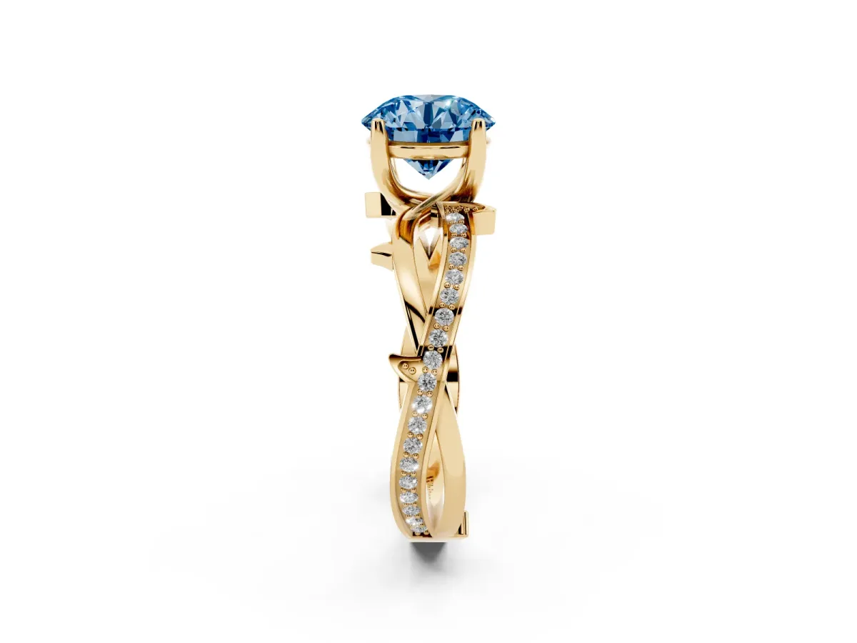 Fancy Blue Round Cut Solitaire Twist Band with Pavé Accents and Four-Prong Setting Yellow gold