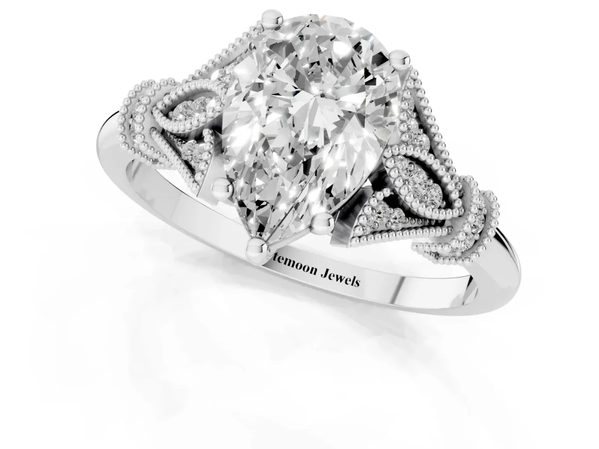 Pear Cut Diamond Solitaire Ring with Floral Filigree and Pave Accents Silver