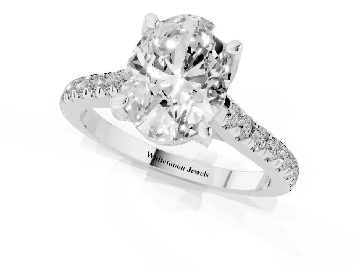 Oval Cut Brilliant Diamond Solitaire with Pavé Band and Four-Prong Setting Silver
