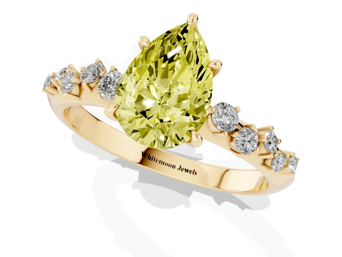 Fancy Yellow Pear Cut Diamond Cluster Side Stone Solitaire Ring with Prong Setting Yellow gold