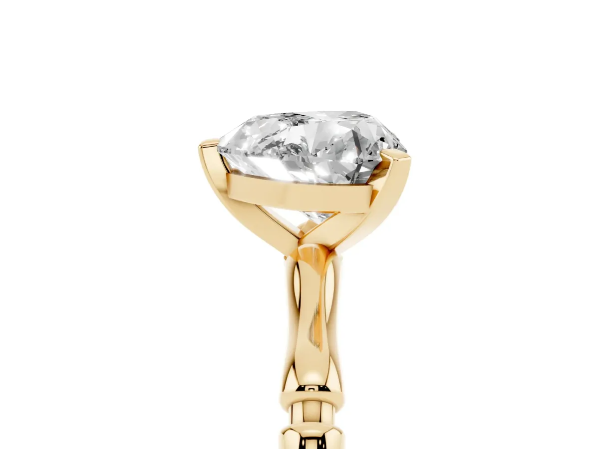 Heart Cut Solitaire Diamond Ring with Bamboo Band and Four-Prong Setting Yellow gold
