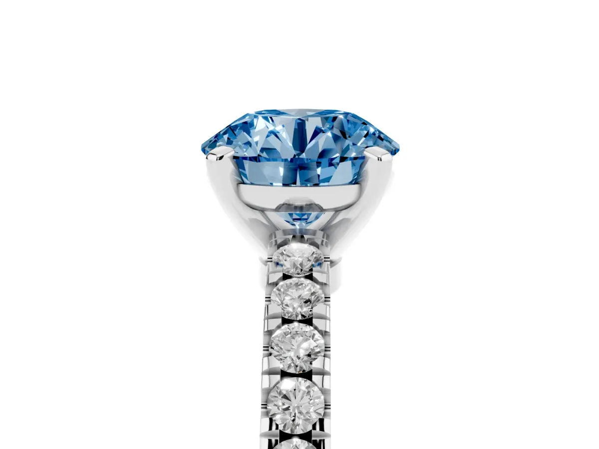 Fancy Blue Round Cut Solitaire Diamond with Pavé Band and Four-Prong Setting Silver