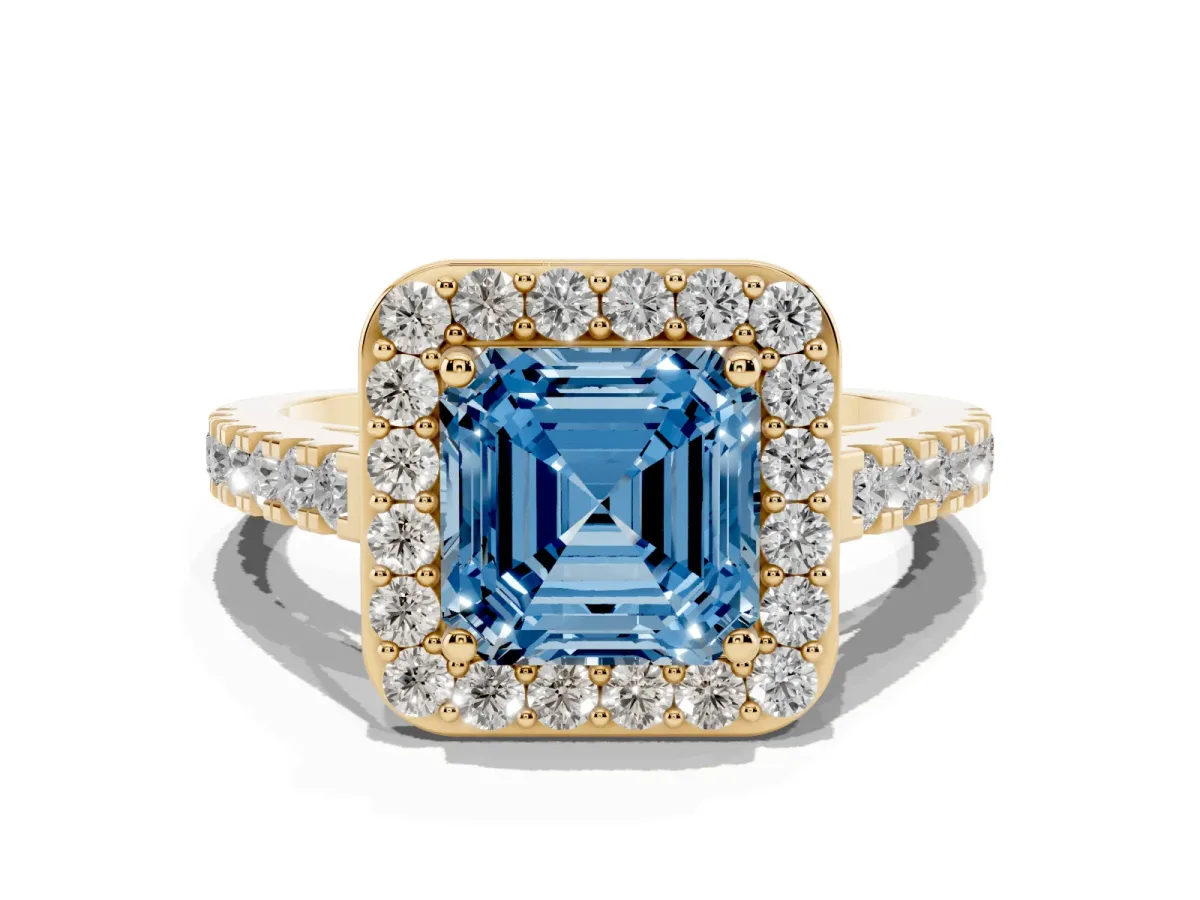 Fancy Blue Asscher Cut Diamond Halo Ring with Round Pavé Split Shank and Prong Setting Yellow gold