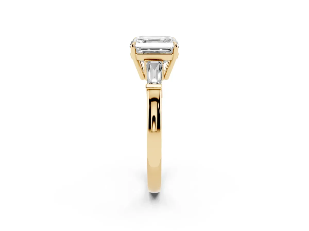 Asscher Cut Diamond Three-Stone Ring with Tapered Baguette Side Stones and Prong Setting Yellow gold