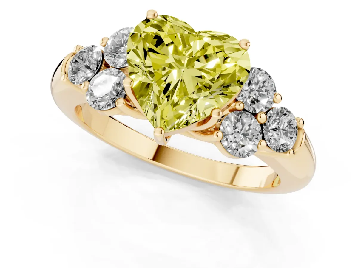 Fancy Yellow Heart Cut Cut Diamond Cluster Ring with Round Accent Stones and Prong Setting on a Classic Band Yellow gold