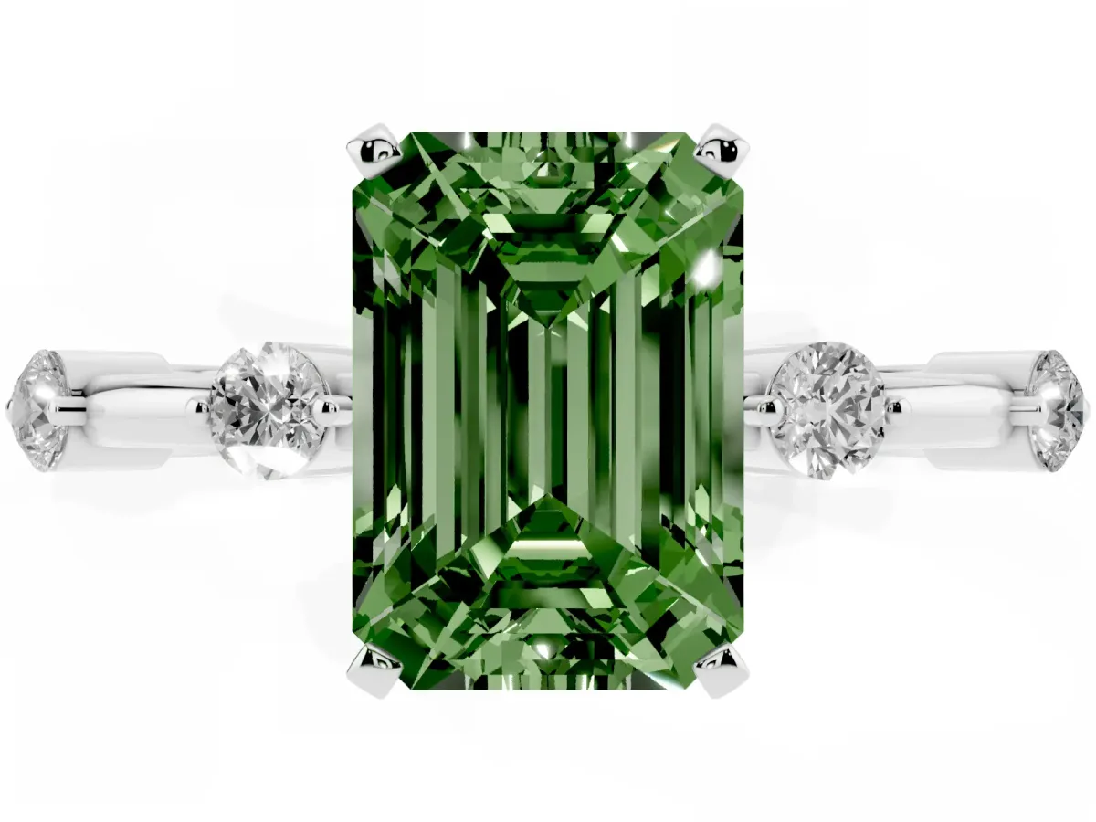 Fancy Green Emerald Cut Solitaire Diamond Ring with Bezel Set Side Stones and Prong Setting Silver