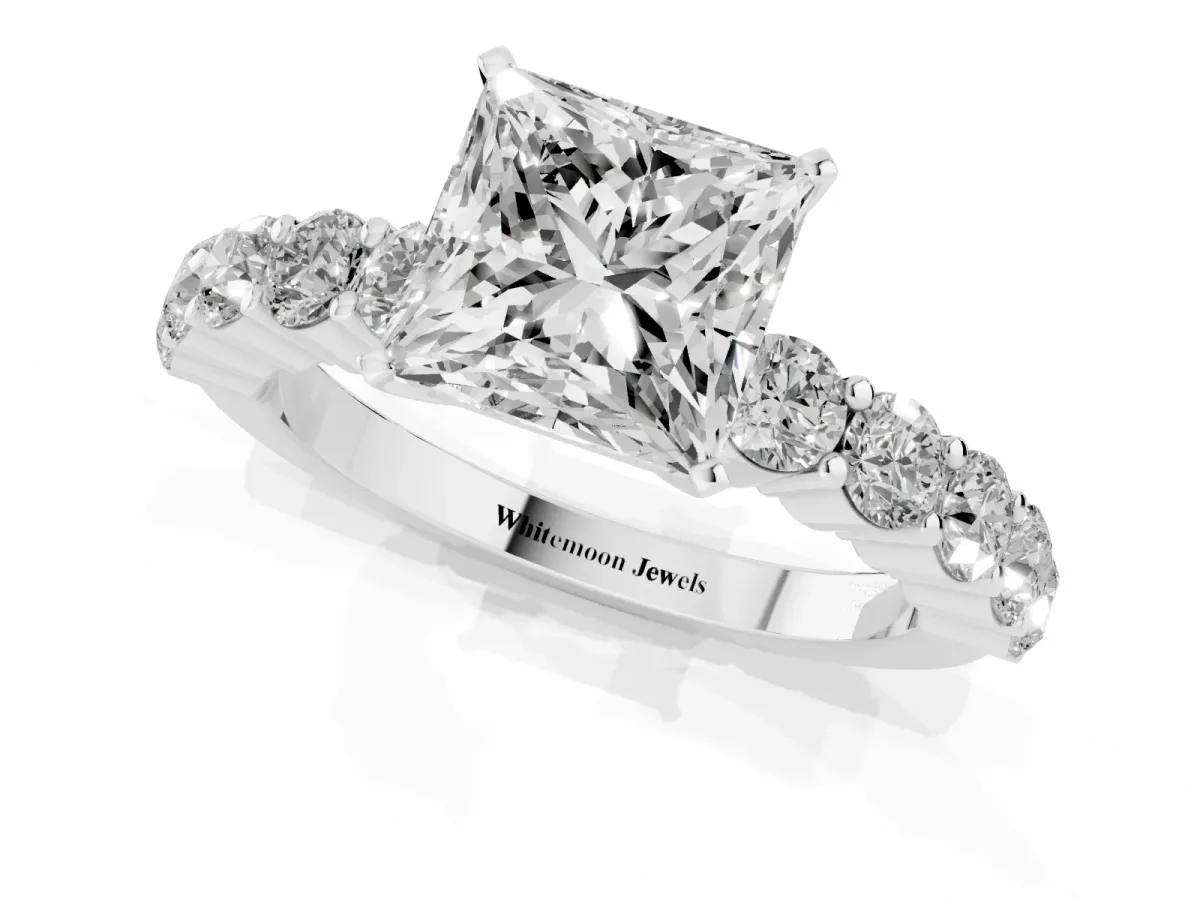Princess Cut Diamond Solitaire Ring with Shared Prong Round Side Stones Silver