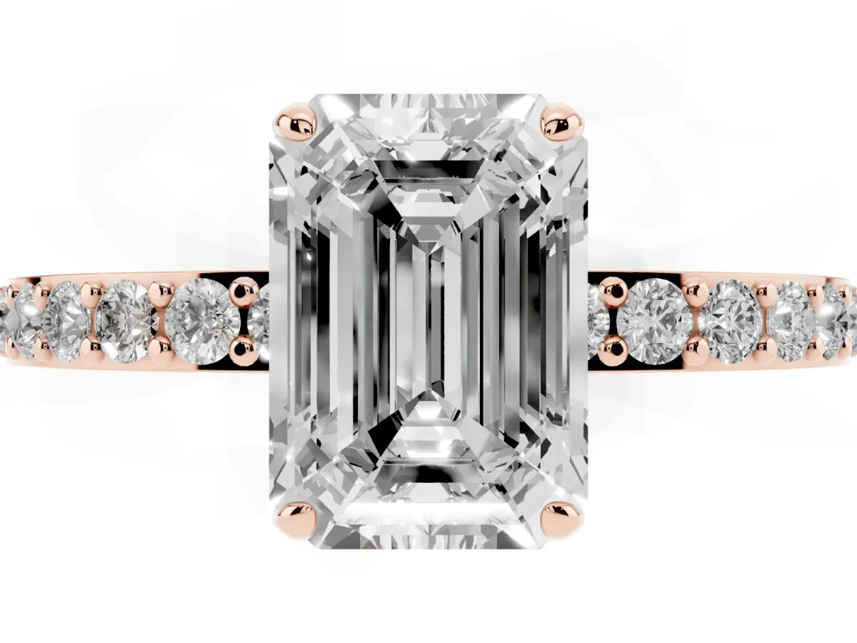 Emerald Cut Diamond Solitaire Engagement Ring with Pavé Band and Four-Prong Setting Rose gold