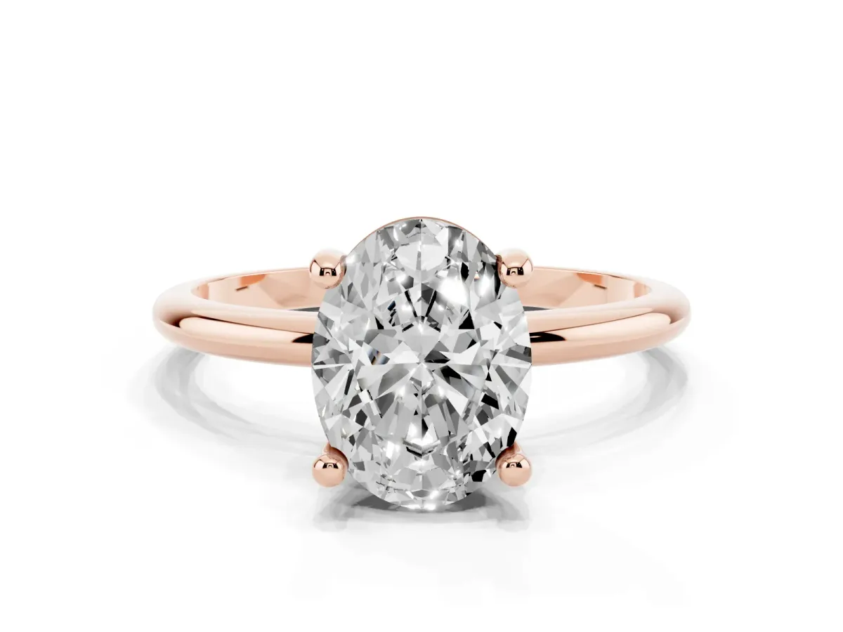Oval Cut Solitaire Diamond Ring with 4-Prong Setting on a Classic Band Rose gold