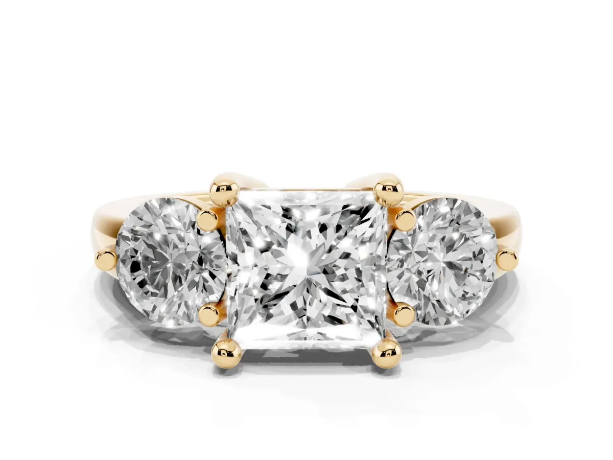 Three-Stone Princess Cut Brilliant Cut Solitaire Ring with Prong Setting on a Classic Band Yellow gold
