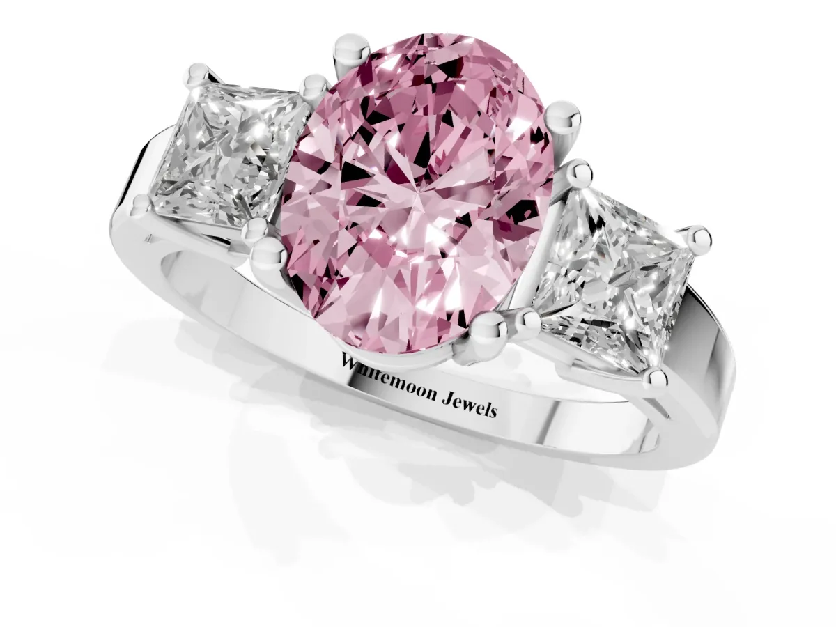 Fancy Pink Three-Stone Oval Cut Cut Solitaire Ring with Prong Setting Platinum
