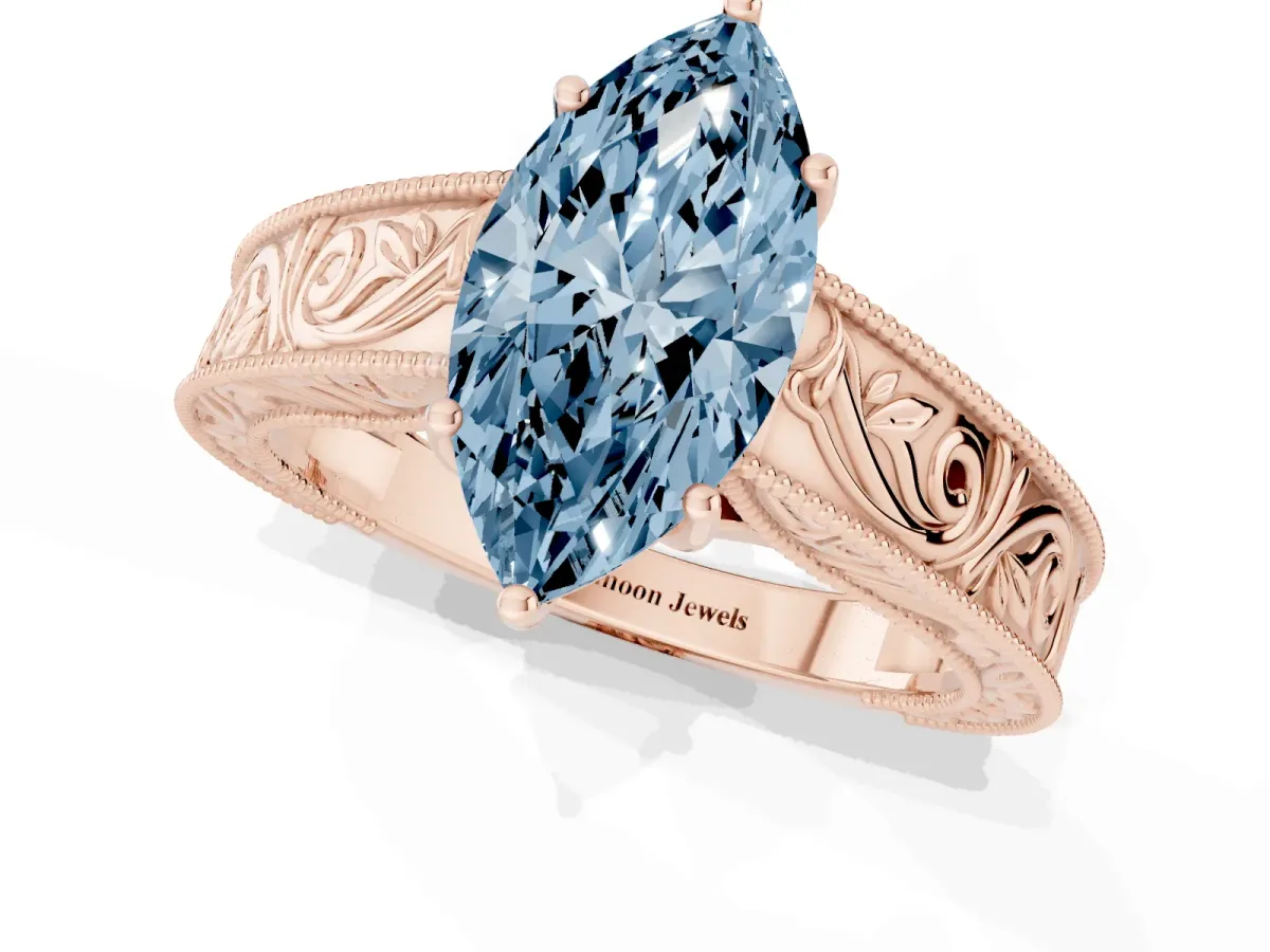 Fancy Blue Marquise Cut Diamond Solitaire Ring with Engraved Band and Four-Prong Setting Rose gold
