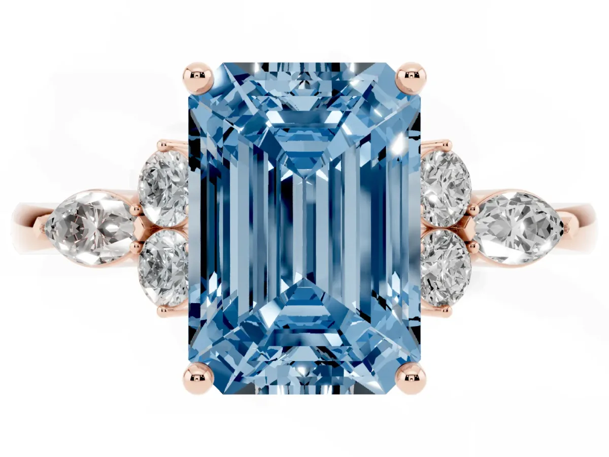 Fancy Blue Emerald Cut Brilliant Diamond Solitaire Ring with Pear Side Stones and Four-Prong Setting Rose gold