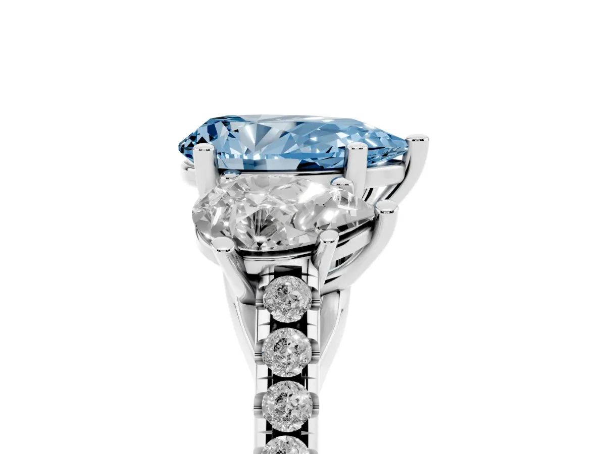 Fancy Blue Three-Stone Pear Cut Diamond Ring with Round Pavé Band and Prong Setting Silver