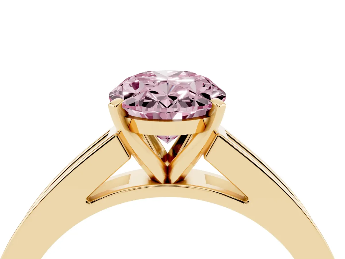 Fancy Pink Oval Cut Solitaire Diamond Ring with Channel-Set Band and Four-Prong Setting Yellow gold