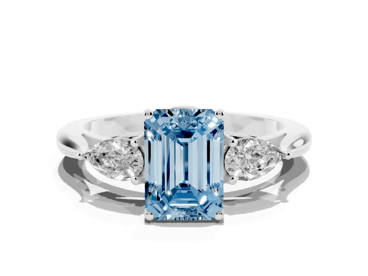 Fancy Blue Emerald Cut Diamond Three-Stone Ring with Pear Side Stones and Prong Setting Platinum
