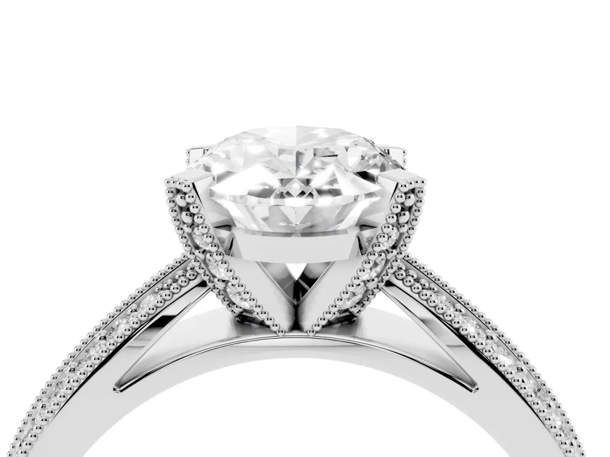 Oval Cut Diamond Solitaire Ring with Milgrain Round Pavé Band and Prong Setting Platinum