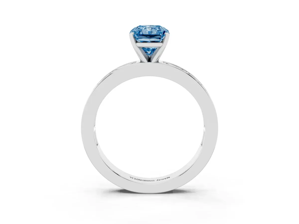 Fancy Blue Radiant Cut Solitaire Diamond Ring with Channel-Set Baguette Band and Four-Prong Setting Silver