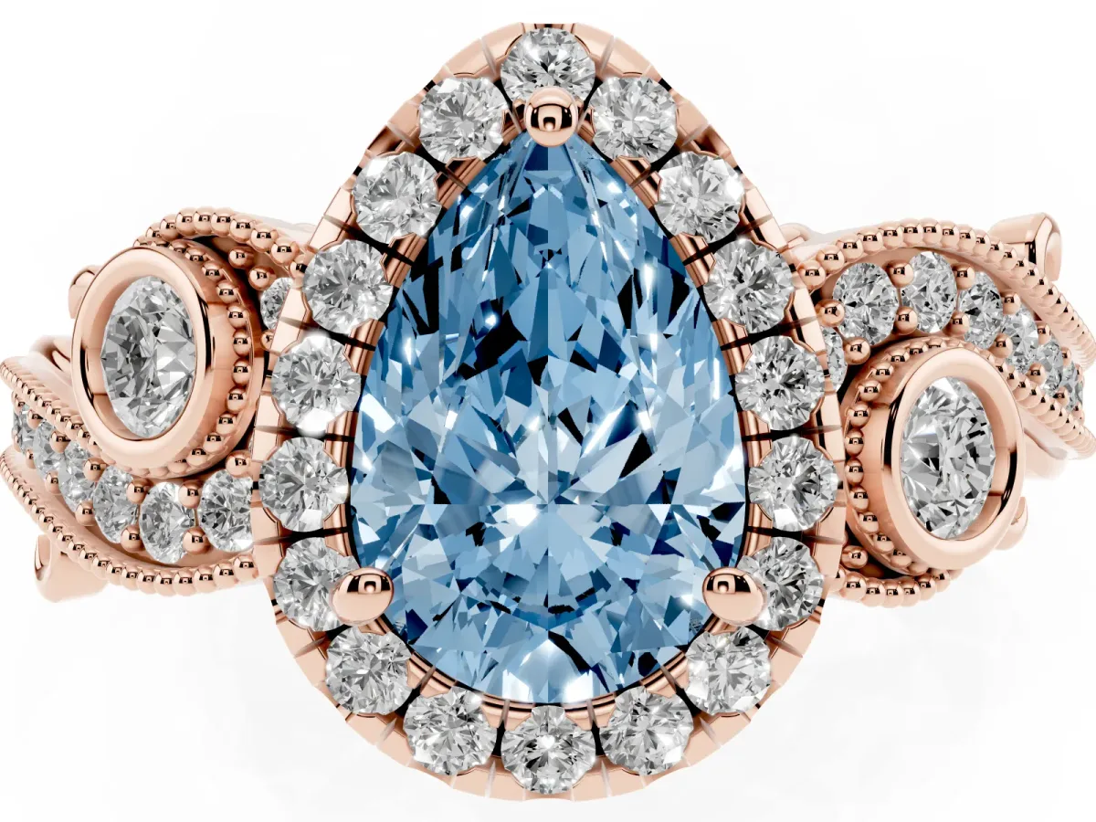 Fancy Blue Pear Cut Halo Diamond Ring with Milgrain and Bezel Accents on a Split Shank Band Rose gold