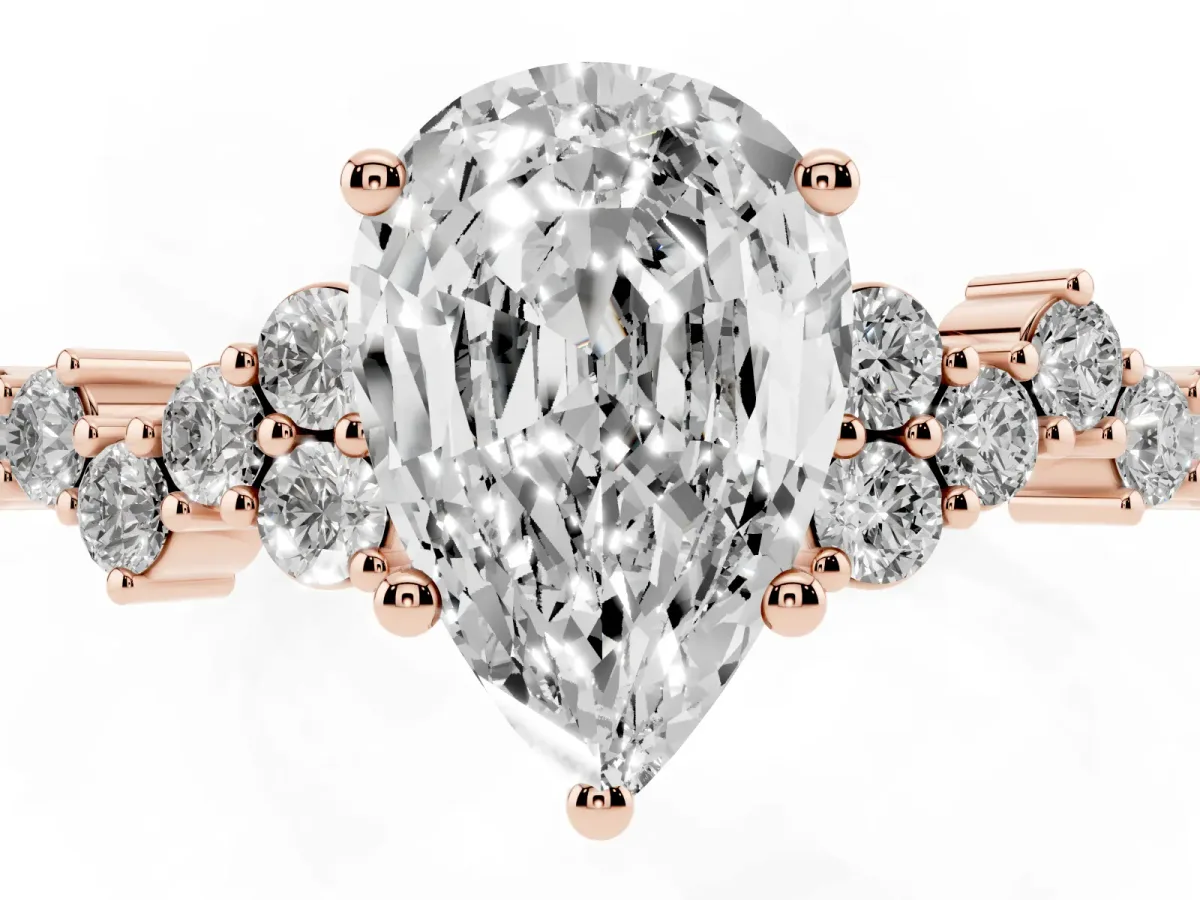 Pear Cut Diamond Scattered Round Accent Ring with Prong Setting Rose gold
