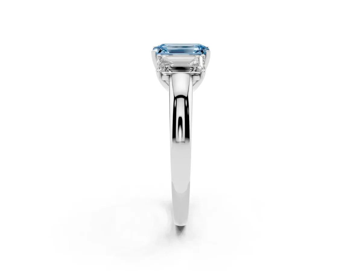 Fancy Blue Emerald Cut Diamond Three-Stone Ring with Four-Prong Setting and Classic Band Platinum
