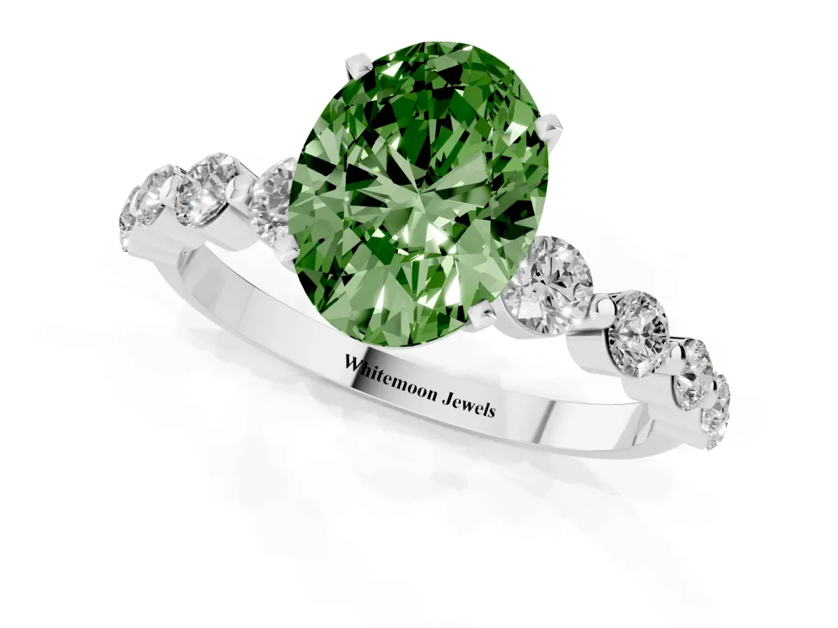 Fancy Green Oval Cut Solitaire Diamond Ring with Pave Band and Four-Prong Setting Silver