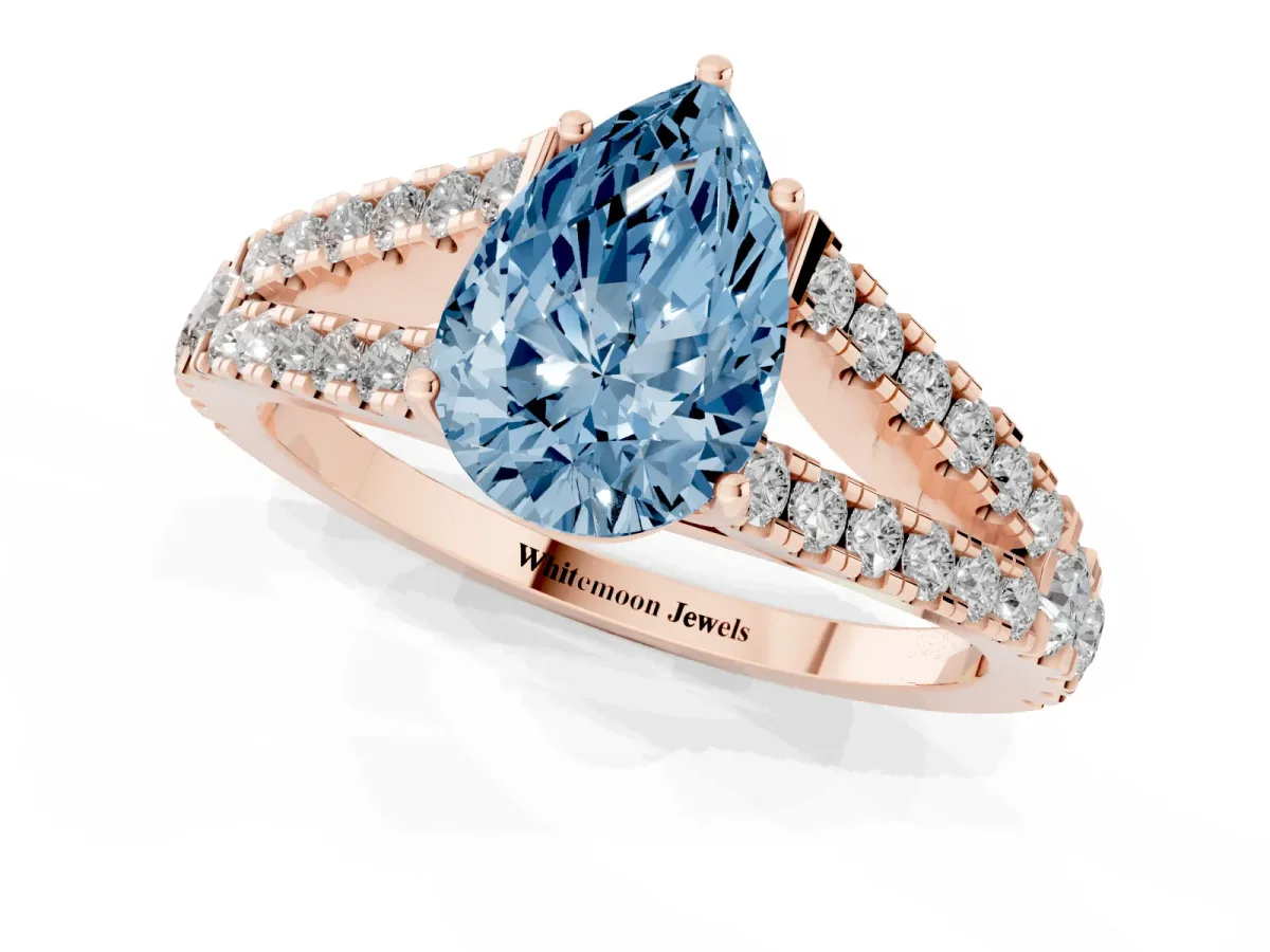 Fancy Blue Pear Cut Diamond Split Shank Pavé Engagement Ring with Four-Prong Setting Rose gold