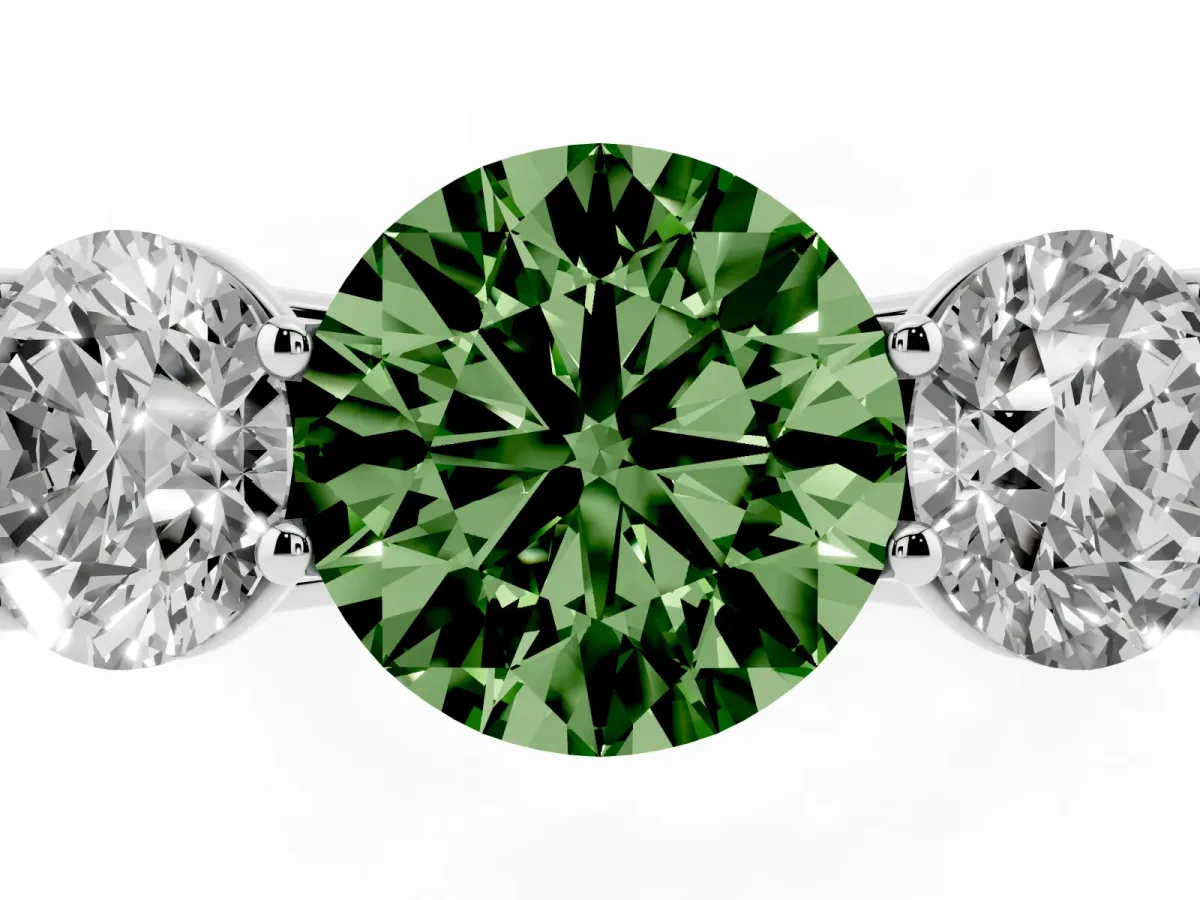 Fancy Green Round Cut Three-Stone Diamond Ring with Prong Setting on a Classic Band Silver