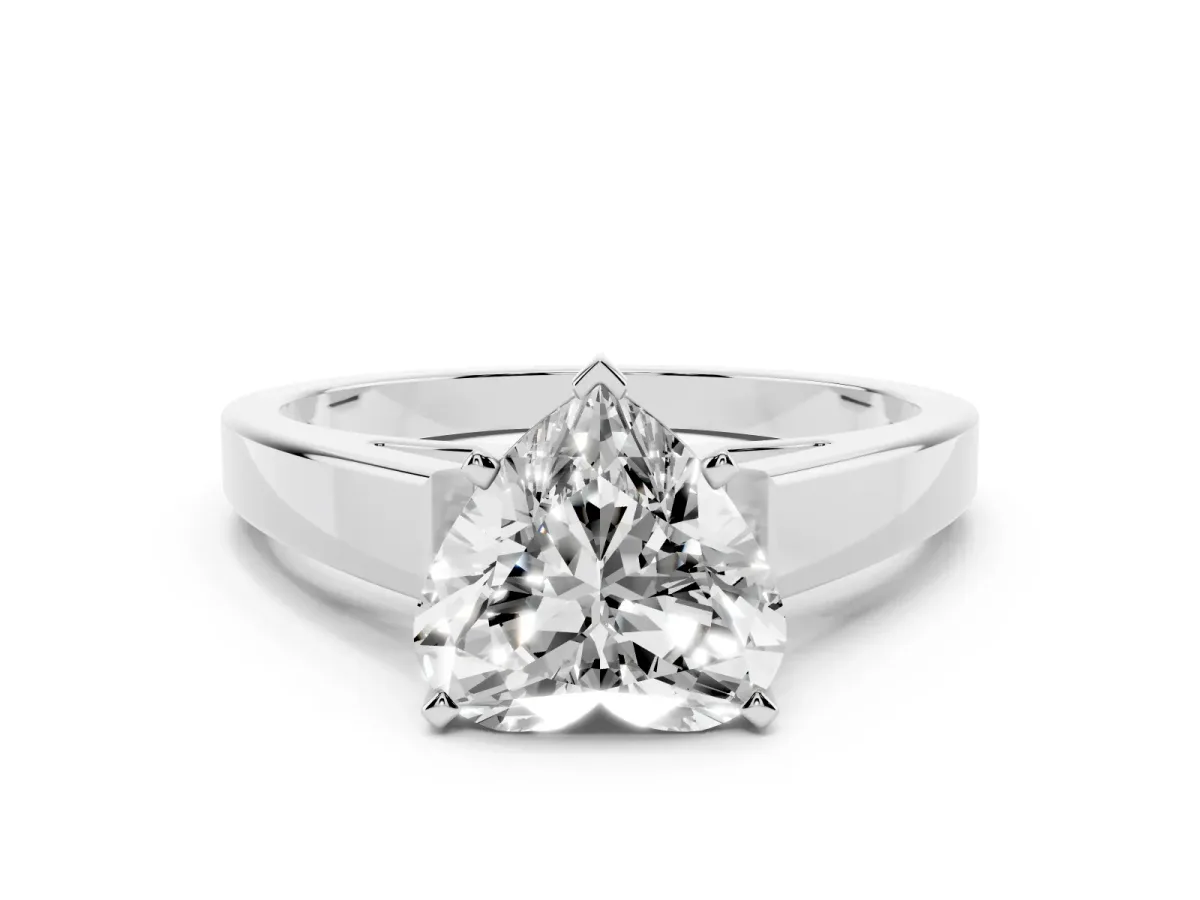 Heart Cut Solitaire Engagement Ring with Four-Prong Setting and Tapered Band Silver